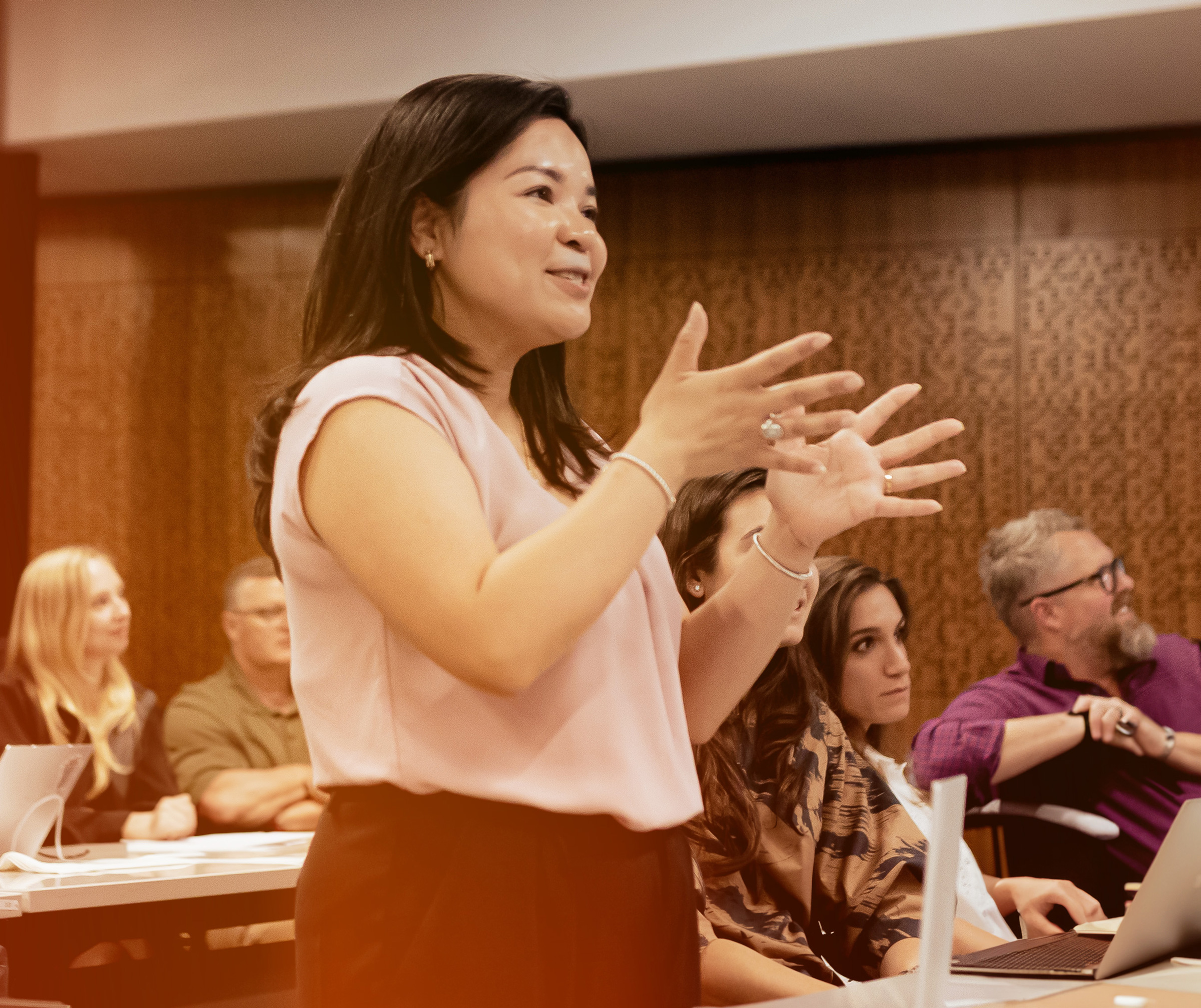 Woman Standing in Meeting